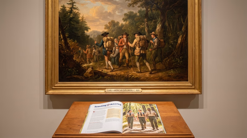 Early American explorers walking through rugged wilderness with heavy packs